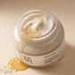 Angle : vue plongeante 35°  Open Beauty of Joseon Ground Rice and Honey Glow Mask jar showing rich creamy texture with visible rice particles, honey drizzle nearby, soft beige background, luxury skincare editorial photography, photorealistic texture details, premium cosmetic campaign. (gemini-3-pro-image-preview)