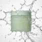 Action commercial photography of Celimax Heartleaf BHA Peeling Pad jar. A crisp, clear, high-speed splash of pure water enveloping the container, capturing frozen water droplets in mid-air. Bright and clean aesthetic, studio lighting, hyper-realistic water physics, professional product presentation --ar 1:1 (gemini-3-pro-image-preview)
