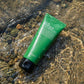 extreme close up flatlay photo of the bottle, the bottle is floating inside a river flowing , (gemini-3-pro-image-preview)