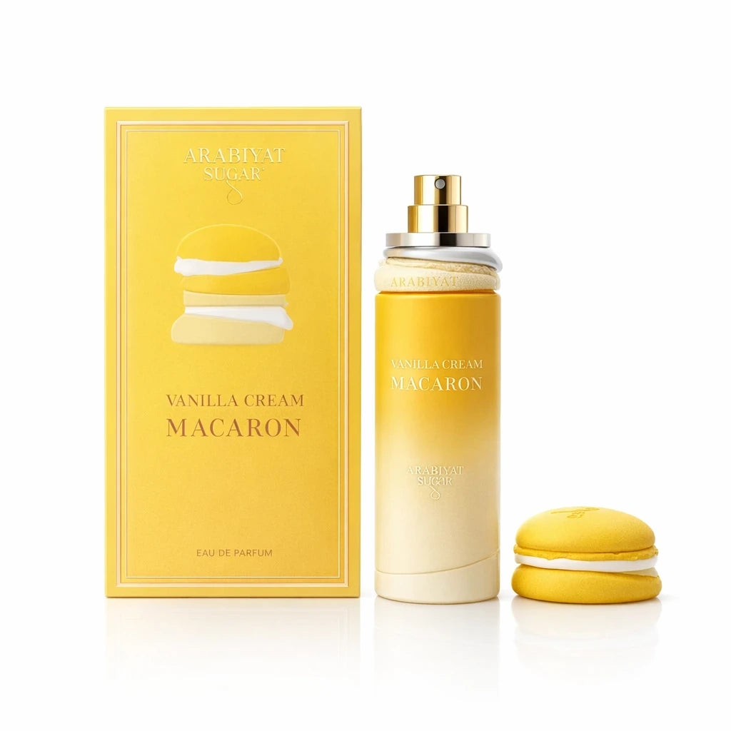 Premium commercial studio shot of the Arabiyat Sugar Vanilla Cream Macaron perfume bottle with its macaron-shaped cap placed beside it, referenced from image_5131c8.jpg. Front-facing composition, perfectly centered. Soft, luminous professional lighting highlights the elegant pastel yellow gradient and the matte textures of the pastry-themed cap. High-end modern gourmand fragrance e-commerce style, flawless and airy. Aspect ratio 1:1, size 1200x1200px. (gpt-image-1.5)