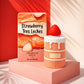 Bold, contemporary e-commerce product shot of the Arabiyat Sugar Strawberry Tres Leches perfume bottle and box (image_519704.jpg). The products are displayed on a matte pastel salmon-pink geometric pedestal against a clean, contrasting solid red or soft ivory backdrop. Sharp, modern architectural shadows cut elegantly across the frame, simulating a luxury niche fragrance boutique display. Fresh, playful, and striking layout. Aspect ratio 1:1, size 1200x1200px. (gpt-image-1.5)