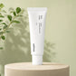 Commercial product photography of a "50ml Celimax Noni Energy Repair Cream" green jar, closed, centered on a matte beige concrete podium. Clean minimalist studio background with soft pastel olive green tones, professional studio lighting, delicate soft shadows, shot on 85mm lens, f/4, high resolution, hyper-realistic, photorealistic --ar 1:1 (gpt-image-2)