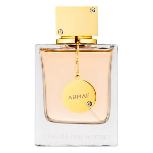 Armaf Club de Nuit Eau de Parfum for women, a luxurious fragrance bottle with elegant gold accents and a sleek black cap, displayed on a reflective surface.