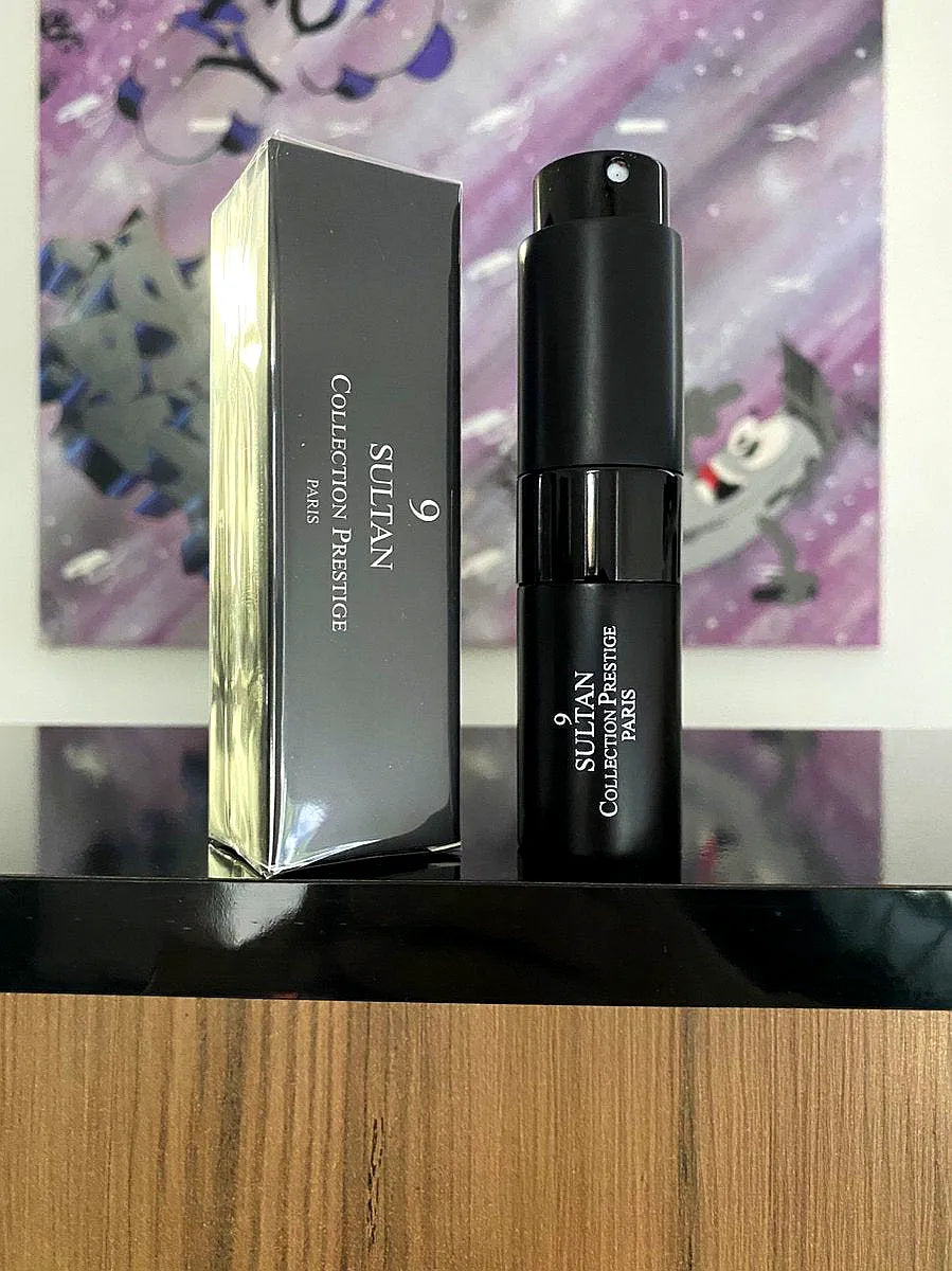 Elegant bottle of Collection Prestige - Sultan - Eau de Parfum Mixte with gold accents and luxurious design.